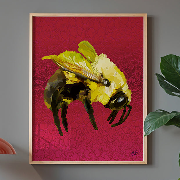 Framed bumblebee print by Joy and Fury Art on a gray wall