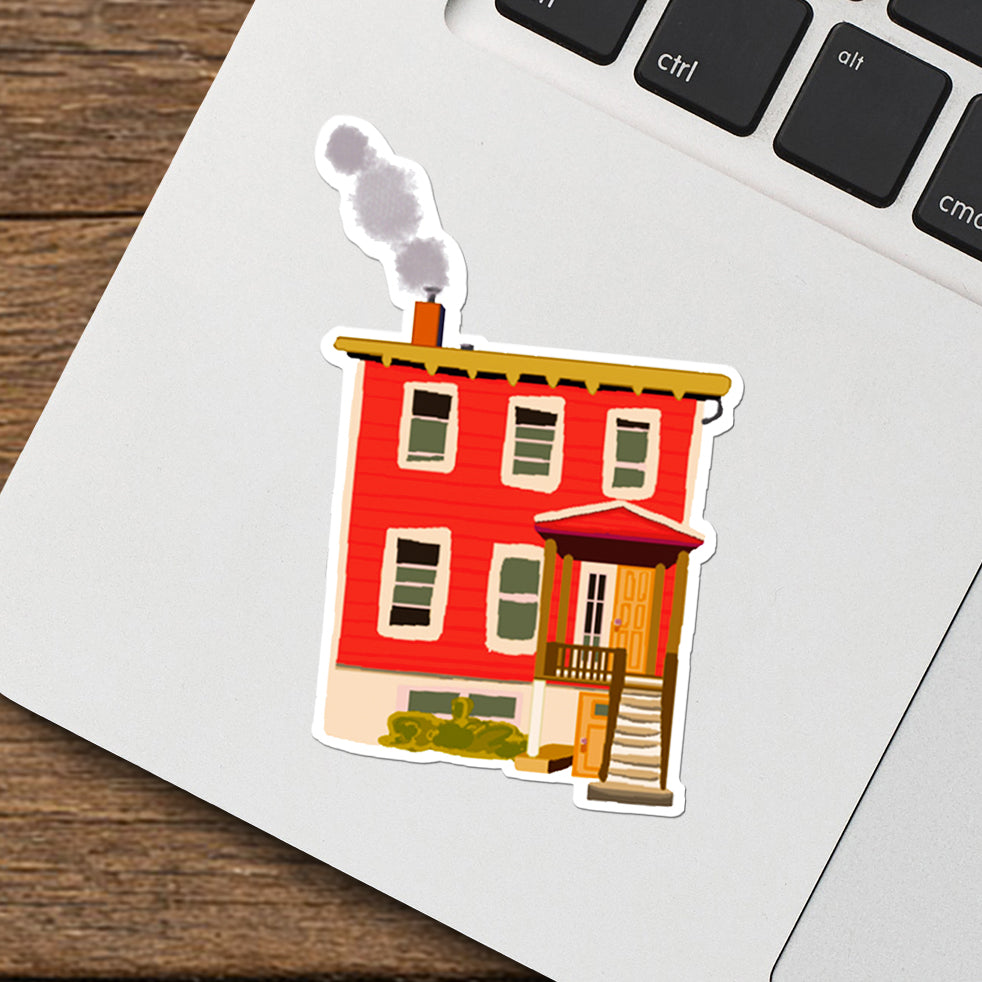 Happy Home Red vinyl sticker by Joy and Fury Art on a surface